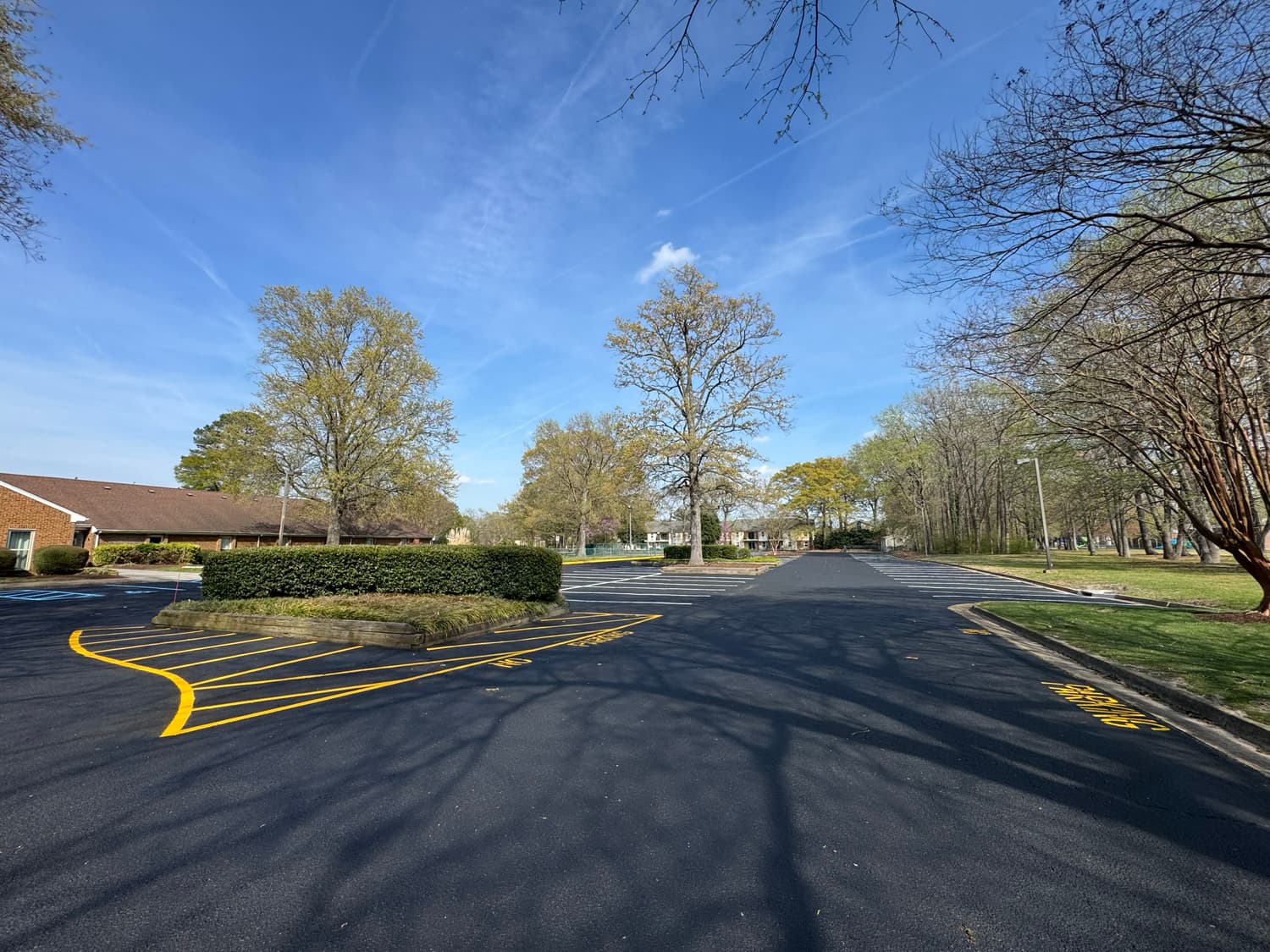 Wide view of newly sealcoated asphalt surface